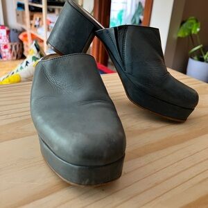 Intentionally Blank blue clogs.